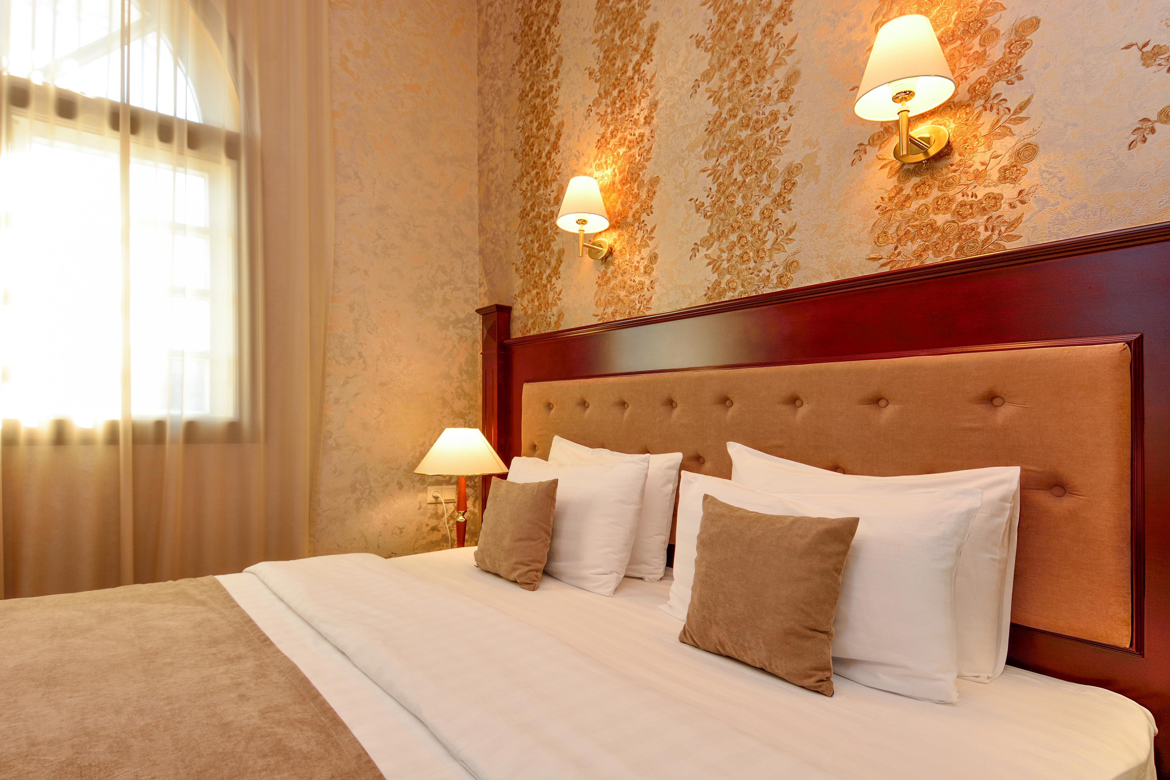 River Side Hotel Tbilisi Bagian luar foto A bedroom at the hotel